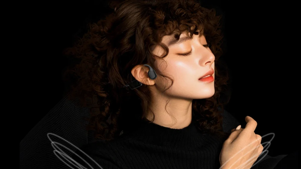 Are Bone Conduction Headphones Safe for Your Hearing? user wear bone conduction headphone with open ears listening music
